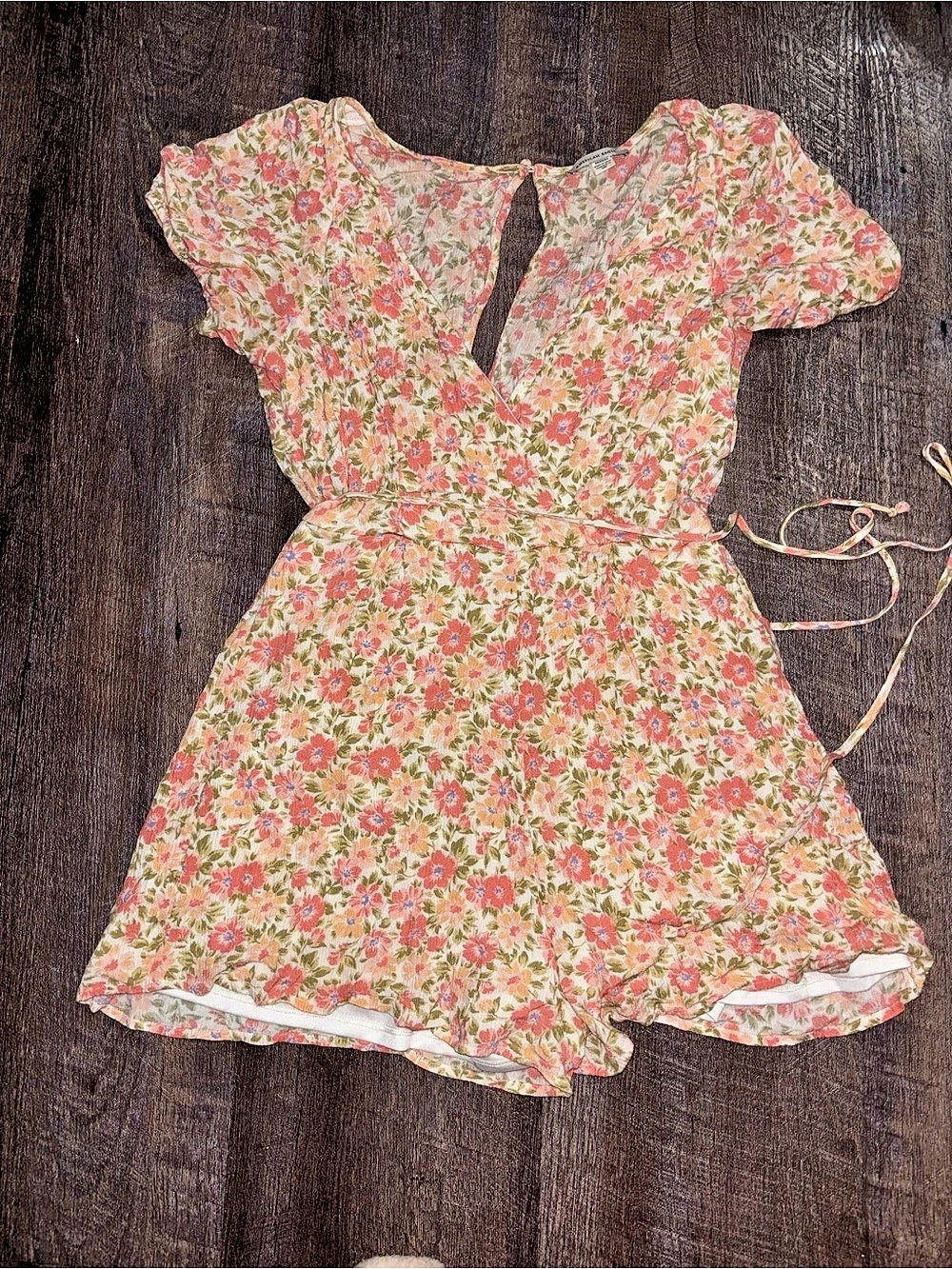 American Eagle Outfitters AE Floral Wrap-Front Romper Floral Mini Romper in Pink